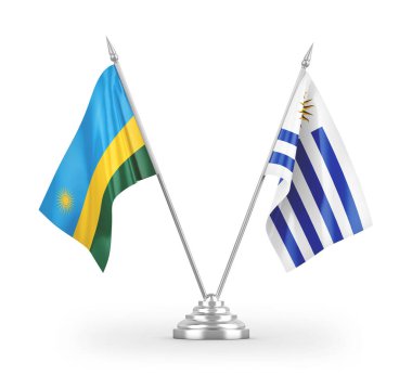 Beyaz arkaplan üzerinde izole edilmiş Uruguay ve Ruanda masa bayrakları