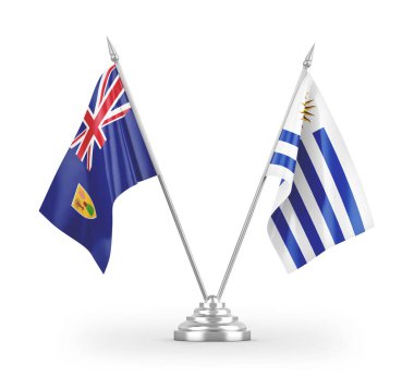 Uruguay ve Türkler ve Caicos Adaları masa bayrakları beyaz arkaplan 3d görüntüleme
