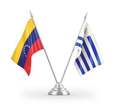Beyaz zemin üzerinde izole edilmiş Uruguay ve Venezuela masa bayrakları
