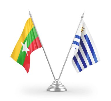 Beyaz arkaplan üzerinde izole edilmiş Uruguay ve Myanmar masa bayrakları