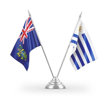 Beyaz arkaplan üzerinde izole edilmiş Uruguay ve Pitcairn Adaları masa bayrakları 3d