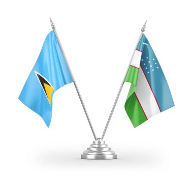 Özbekistan ve Saint Lucia masa bayrakları beyaz arkaplanda izole edilmiş 3D görüntüleme