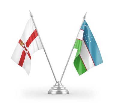 Özbekistan ve Kuzey İrlanda masa bayrakları beyaz arkaplanda izole edilmiş 3D görüntüleme