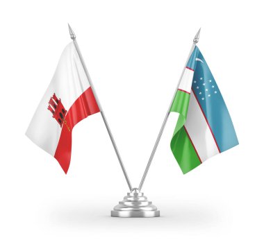 Özbekistan ve Cebelitarık masa bayrakları beyaz arkaplan 3D görüntüleme üzerinde izole edildi