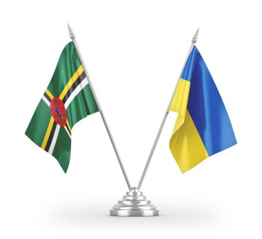 Beyaz arkaplan üzerinde izole edilmiş Ukrayna ve Dominica masa bayrakları