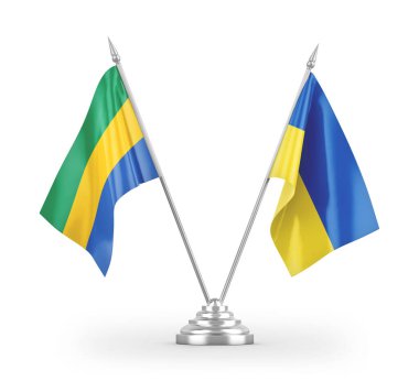 Beyaz arkaplan üzerinde izole edilmiş Ukrayna ve Gabon masa bayrakları