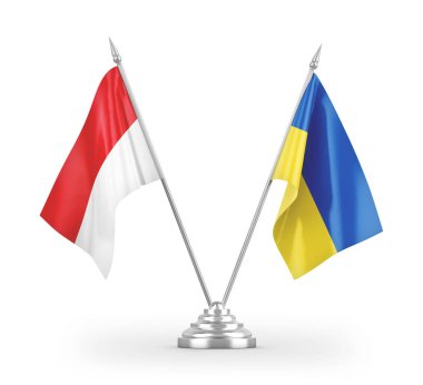 Beyaz arkaplan üzerinde izole edilmiş Ukrayna ve Endonezya masa bayrakları 3d