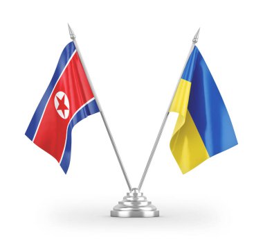 Ukrayna ve Kuzey Kore masa bayrakları beyaz arka planda 3 boyutlu görüntüleme