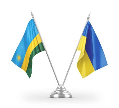 Beyaz arkaplan üzerinde izole edilmiş Ukrayna ve Ruanda masa bayrakları