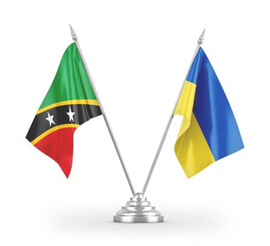 Ukrayna, Saint Kitts ve Nevis masa bayrakları beyaz arkaplanda izole edilmiş 3D görüntüleme