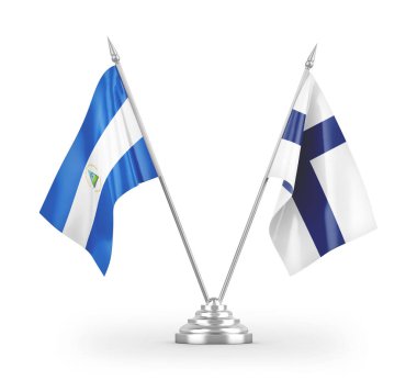 Finlandiya ve Nikaragua masa bayrakları beyaz arkaplanda izole edilmiş 3d görüntüleme