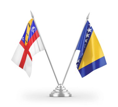 Bosna-Hersek ve Herm masa bayrakları beyaz arkaplandaki 3D görüntülere izole edildi