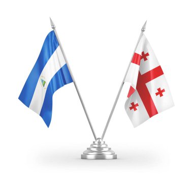 Gürcistan ve Nikaragua masa bayrakları beyaz arkaplanda 3 boyutlu görüntüleme