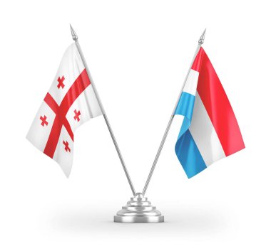 Lüksemburg ve Gürcistan masa bayrakları beyaz arka planda izole edilmiş 3D görüntüleme