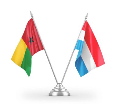 Lüksemburg ve Gine-Bissau masa bayrakları beyaz arkaplanda izole edilmiş 3d görüntüleme