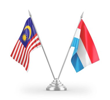 Beyaz arkaplanda izole edilmiş Lüksemburg ve Malezya masa bayrakları 3d