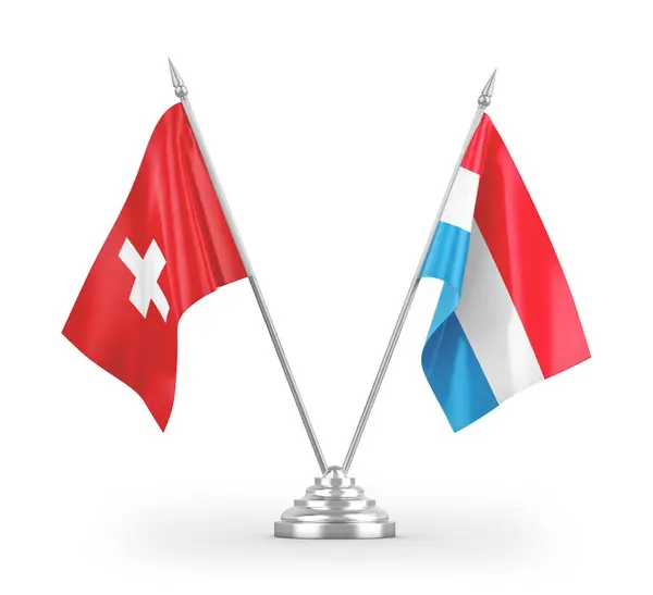在白色背景下隔离的卢森堡和瑞士桌旗3D渲染 — 图库照片