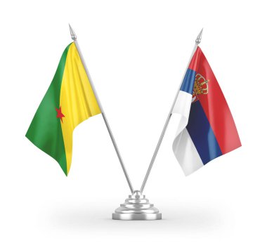 Sırbistan ve Fransız Guyanası masa bayrakları beyaz arkaplandaki 3D görüntülere izole edilmiş