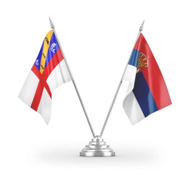 Sırbistan ve Herm masa bayrakları beyaz arkaplandaki 3D görüntülere izole edildi