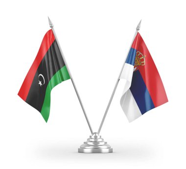 Sırbistan ve Libya masa bayrakları beyaz arkaplandaki 3D görüntülere izole edilmiş