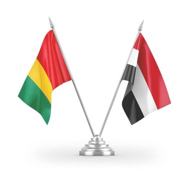 Beyaz arkaplandaki Yemen ve Gine masa bayrakları 3 boyutlu görüntüleme