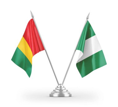 Beyaz zemin üzerinde izole edilmiş Nijerya ve Gine masa bayrakları