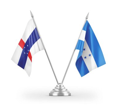 Beyaz zemin üzerinde izole edilmiş Honduras ve Hollanda Antilleri masa bayrakları 3d