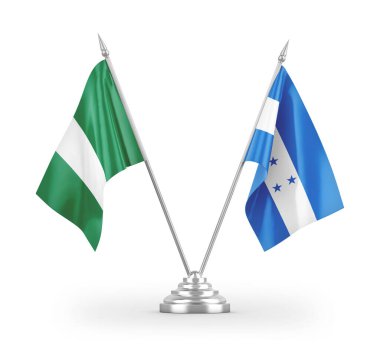Beyaz arkaplanda izole edilmiş Honduras ve Nijerya masa bayrakları 3D görüntüleme