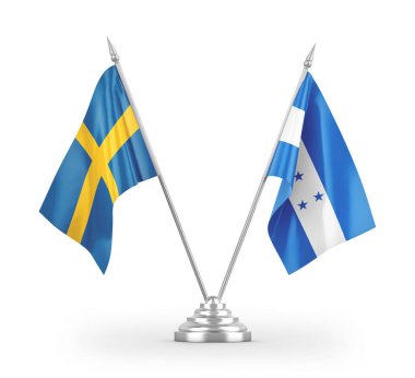 Beyaz arkaplan üzerinde izole Honduras ve İsveç masa bayrakları 3d