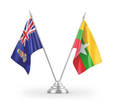 Myanmar ve Cayman Adaları masa bayrakları beyaz zemin üzerinde izole edilmiş 3D görüntüleme