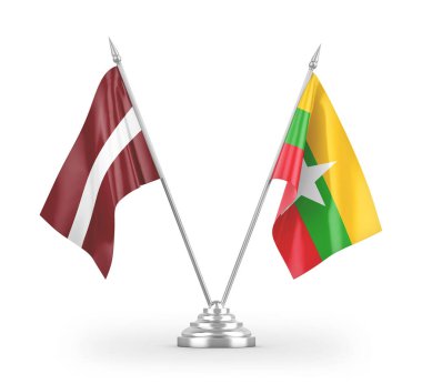 Beyaz arkaplan üzerinde izole edilmiş Myanmar ve Letonya masa bayrakları