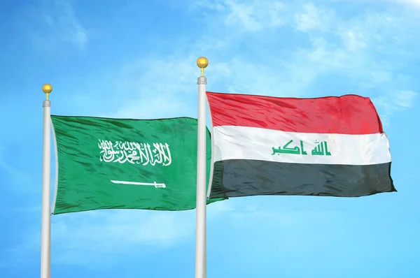 Arabia Saudita Irak Dos Banderas Sobre Asta Bandera Fondo Azul —  Fotos de Stock
