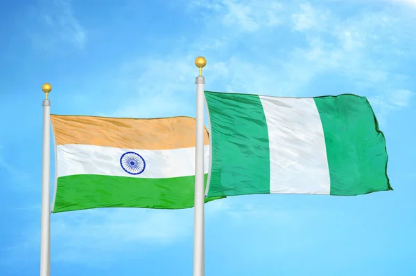 India Nigeria Two Flags Flagpoles Blue Cloudy Sky Background — Stock Photo, Image