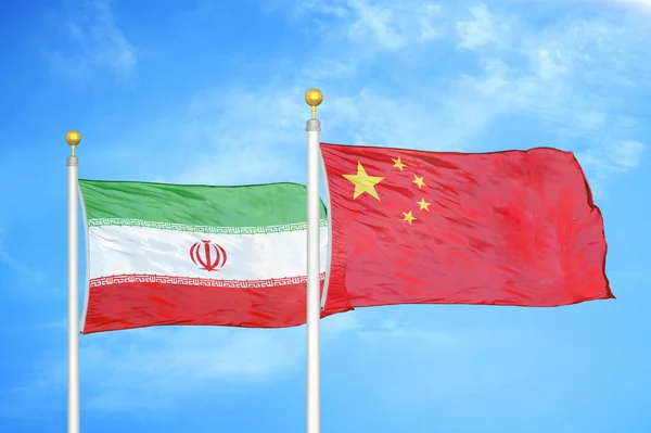 Iran China Two Flags Flagpoles Blue Cloudy Sky Background — Stock Photo, Image