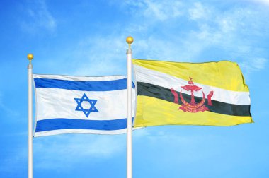 İsrail ve Brunei Darussalam bayrak direkleri üzerinde iki bayrak ve mavi bulutlu arka plan