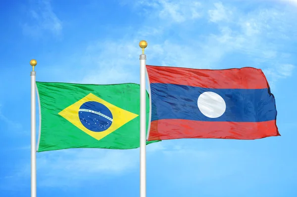 Brazil Laos Two Flags Flagpoles Blue Cloudy Sky Background — Stock Photo, Image