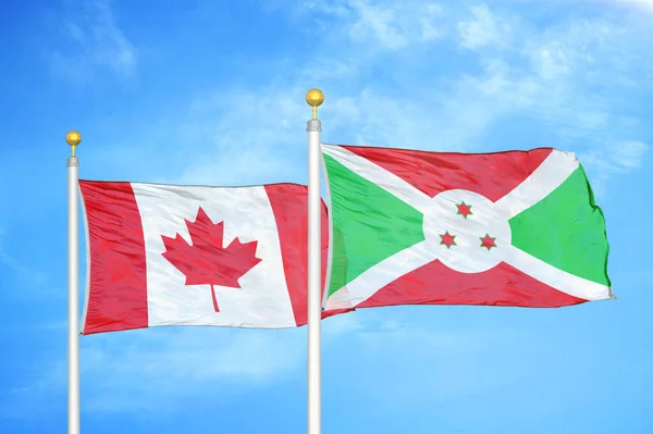 Canadá Burundi Dos Banderas Sobre Asta Bandera Fondo Azul Cielo — Foto de Stock