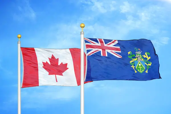 Canada Pitcairn Eilanden Twee Vlaggen Vlaggenmasten Blauwe Bewolkte Lucht Achtergrond — Stockfoto