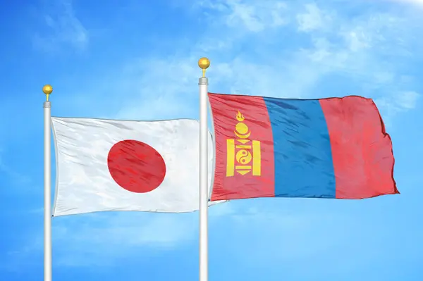 Japan Mongolia Two Flags Flagpoles Blue Cloudy Sky Background — Stock Photo, Image