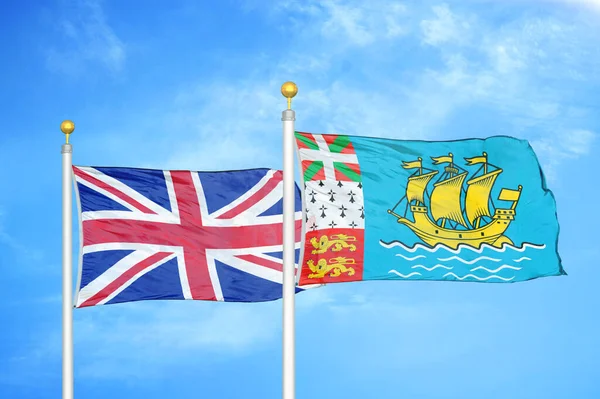 United Kingdom Saint Pierre Miquelon Two Flags Flagpoles Blue Cloudy — Stock Photo, Image