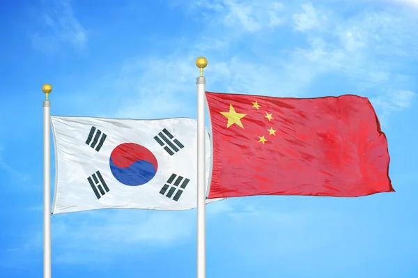 South Korea China Two Flags Flagpoles Blue Cloudy Sky Background — Stock Photo, Image