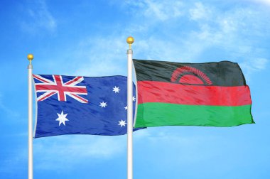 Avustralya ve Malawi bayrak direkleri ve mavi bulutlu arka planda iki bayrak