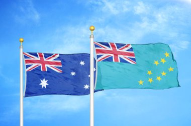 Avustralya ve Tuvalu bayrak direkleri ve mavi bulutlu arka planda iki bayrak