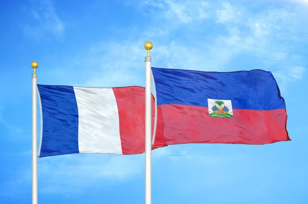 France Haiti Two Flags Flagpoles Blue Cloudy Sky Background — Stock Photo, Image