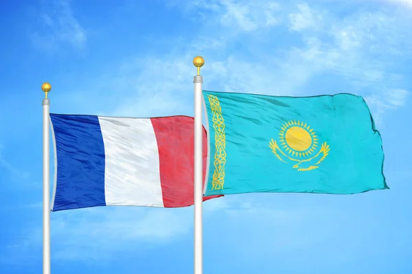 France Kazakhstan Two Flags Flagpoles Blue Cloudy Sky Background — Stock Photo, Image