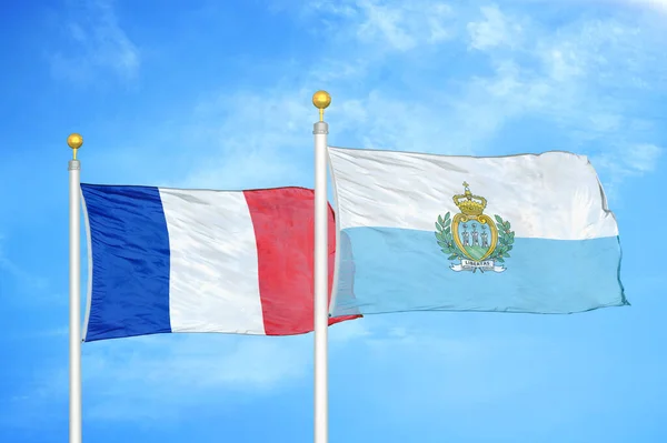 France San Marino Two Flags Flagpoles Blue Cloudy Sky Background — Stock Photo, Image
