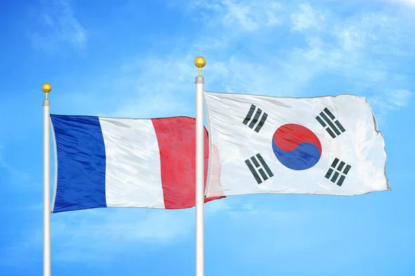 France South Korea Two Flags Flagpoles Blue Cloudy Sky Background — Stock Photo, Image