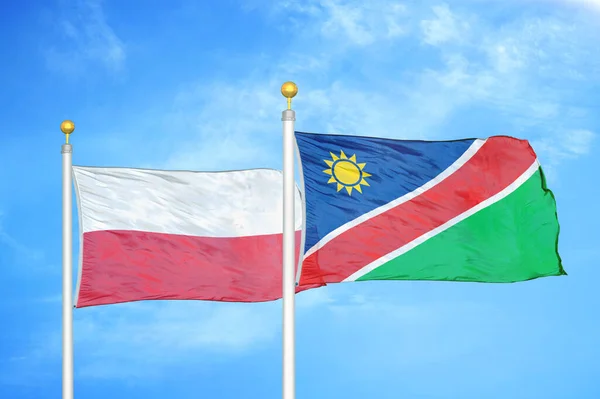 Polonia Namibia Dos Banderas Sobre Asta Bandera Fondo Azul Cielo —  Fotos de Stock