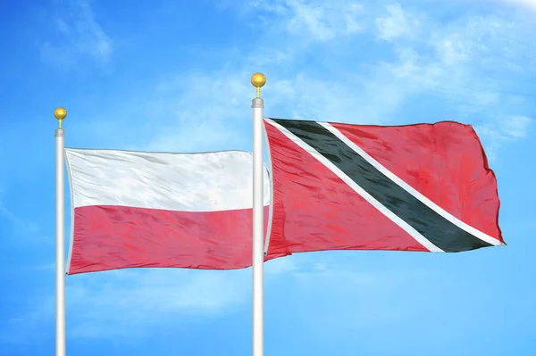 Poland Trinidad Tobago Two Flags Flagpoles Blue Cloudy Sky Background — Stock Photo, Image