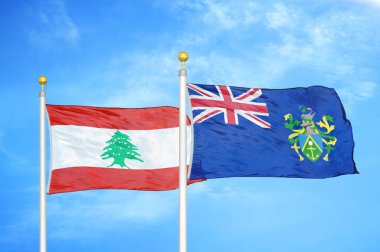 Lübnan ve Pitcairn Adaları bayrak direkleri ve mavi bulutlu arka planda iki bayrak